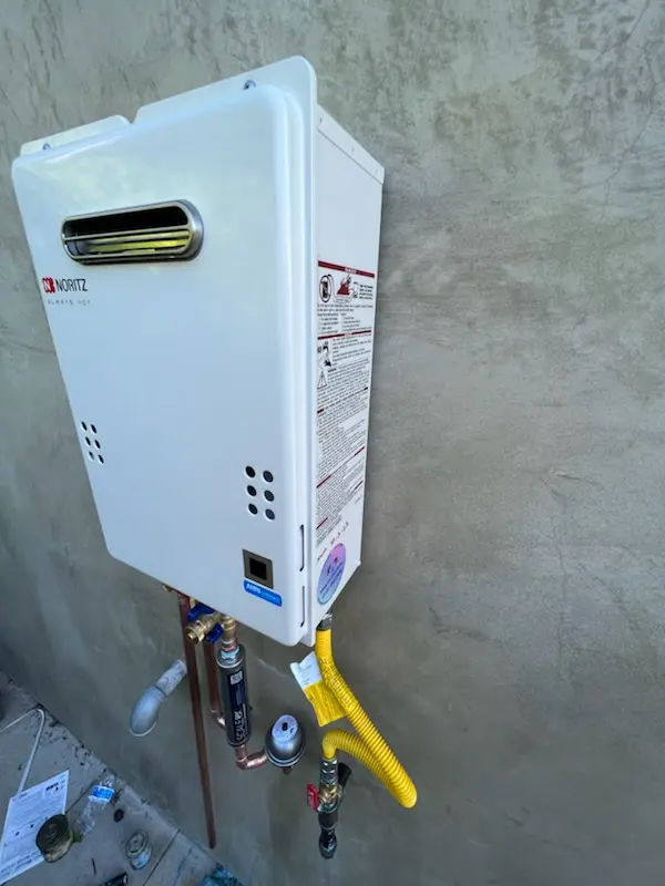 Tankless water heater installation for Carlton Stewart Gardens homes